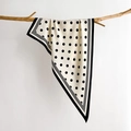 Polka dot silk scarf draped on a wooden branch with soft lighting for a minimalist aesthetic - 88*136*64cm / White