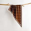 Detailed close-up of a brown polka dot silk scarf with check border on a wood branch - 88*136*64cm / Coffee Brown