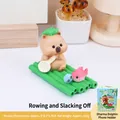 Cute capybara phone stand with crocodile and fish accessories on bamboo base - Slacking Off Capybara (WX056C)