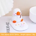Cute duck phone holder figurine with lotus flower and Early Retirement text on stone base - Early Retirement Duck (2530-4A)
