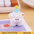 Cute white puppy cake topper with blue party hat for birthday decoration, 5.4cm size - Polite Dog