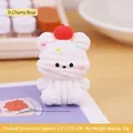 Cute resin bear cake topper with a cherry on head and colorful sprinkles for desktop decor - Cherry