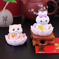 Cute resin rabbit and cat figurines on pink lotus bases for desk or car decoration - Cat And Rabbit Duo
