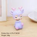 Figurine cerf violet en résine pour bureau avec bois roses et yeux fermés apaisants - Cerf Violet Tête Branlante (2373-1B)