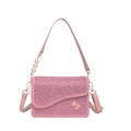 Pink rhinestone crossbody bag featuring a pearl chain and a small teddy bear charm - Pink