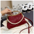 Vintage burgundy pleated shell bag with large pearl handle and metallic gold frame clasp - Burgundy
