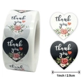 Floral heart thank you stickers on roll, 1 inch white heart labels with red flower patterns - Black and White