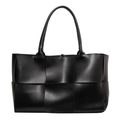 Large black woven leather tote bag in matte finish with wide intrecciato weave design - Black