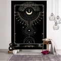 Detail of a black tarot tapestry with golden mystical moon and star symbols on brick wall - Style 14