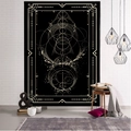 Modern black and gold tarot tapestry with geometric occult patterns on white brick wall - Style 9