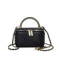 Detail of box handbag with black studs, gold metal handle and dual zipper closure - Black