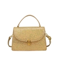 Elegant champagne gold sequined handbag with metal ring buckle and crossbody strap - Gold