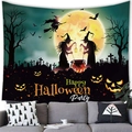 Halloween tapestry with witch, pumpkins and moon above a grey sofa in home setting - 95x73cm