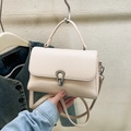 Beige lychee pattern leather crossbody bag with a silver U-shaped metal buckle - Off White