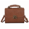 Retro brown embossed leather handbag with vintage floral patterns and adjustable strap - Brown