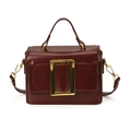 Vintage dark red crossbody bag with glossy leather texture and gold square buckle - Burgundy