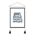 Detail of canvas wall hanging with quote and wooden pole with black tassels decor - 35x50cm / BOOKS, because reality is overrated (Style 3)