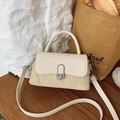 Chic cream leather and straw patchwork handbag with silver twist lock and crossbody strap - Beige