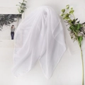 Detail of a white lightweight chiffon scarf showing smooth hem and soft fabric texture - 65x65cm / White