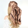 Deep gold satin scarf with black polka dots worn as a headscarf for women - Camel Polka Dot