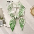 Detail of white twilly silk scarf with green botanical prints and letter P on white texture - Letter P (White Base Dark Green Plant Lines)