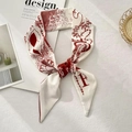 Narrow creamy-white silk scarf with dark red floral prints and an F-letter accent - Letter F (Milky White Crimson Scroll Pattern)