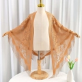 Khaki lace triangle scarf with floral hollow pattern and tassel trim on a mannequin - 180cm / Camel