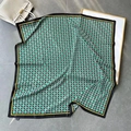 Square silk scarf with green monogram pattern and yellow border on stone background - Fresh Green
