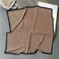 Elegant black and orange silk scarf with floral number print and striped borders - Khaki Plaid