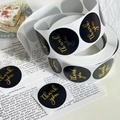 Black round thank you stickers with gold foil script lettering on a roll for gift sealing - 25mm / Black