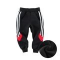 Boys black fleece-lined joggers with white side stripes and red patchwork details - 90cm / Black