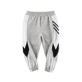 Pantaloni sportivi grigi per bambini con strisce laterali bianche e polsini a costine - Grigio Melange (5073) / 90cm