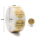 Detailed view of 25mm kraft paper stickers with Hand Made text and heart icons - Smiley Heart Style (C162)