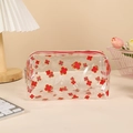 Detailed view of waterproof transparent pencil case with red clover print and gold glitter - Clover (Red)