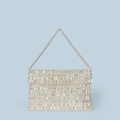 Detailed view of silver beaded handbag featuring glossy woven texture and sturdy top handle - Off White