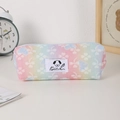 Macro detail of rainbow mesh pencil case with floral patterns and a small dog logo patch - Blue