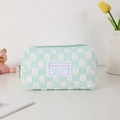 Macro detail of mint green checkerboard pencil case with soft bubble textured fabric - Fruit Green