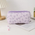 Detail of purple floral seersucker pencil case with textured 3D fabric and zip closure - Purple Floral