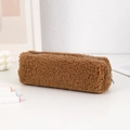 Detailed macro view of the caramel plush pencil case featuring its soft texture and zipper - Coffee