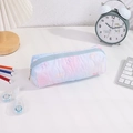 Detail of quilted heart texture and bow pattern on large gradient stationery pouch - Blue