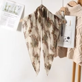 Lightweight pleated floral shawl with vintage print hanging on a wooden hanger - 80*80cm / Light Green