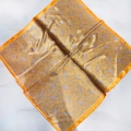 Orange paisley silk scarf with purple and gold patterns on white marble background - Gold Yellow