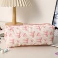 Close-up of quilted floral pencil case with pink bows and heart prints for students - Heart Pattern Bow