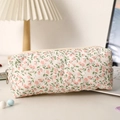 Detailed view of floral quilted cotton pouch with diamond stitching and zipper closure - Stemmed Floral