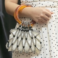 Borsa artigianale di perline con manico in resina ambrata e intreccio di perle - Argento (Manico Ambra)