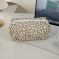 Trousse cosmétique matelassée en coton fleuri avec fermeture éclair près d'un PC - Jaune Fleuri