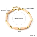Detail showing 5mm pink and beige heishi beads with gold-plated stainless steel clasp - Peach Pink Patchwork Style (BR26500GG)