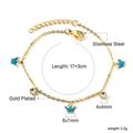 Détail du bracelet en acier inoxydable doré avec breloques couronne bleues et zircons blancs - Couronne en émail (BR26210KG)
