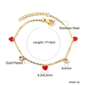 Détail du bracelet en acier inoxydable doré avec cœurs en émail rouge et zircons clairs - Coeur rouge (BR26240EG)