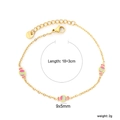 Bracelet doré en acier inoxydable avec trois breloques bonbons émaillées sur fond blanc - Style Chaîne en Or avec Pendentif Bonbon Coloré (BR28970MG)